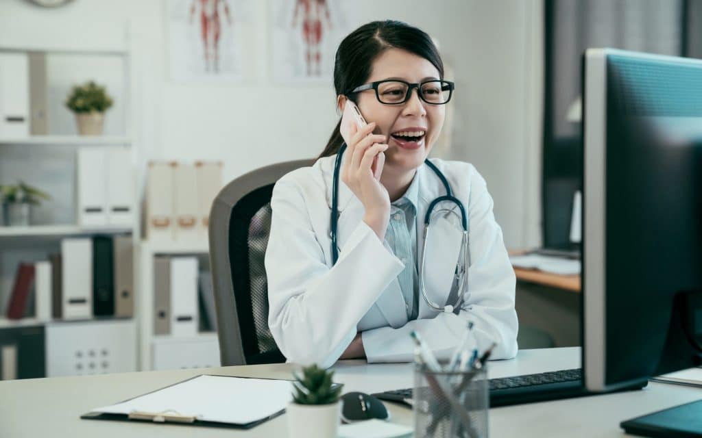 Geriatric Care Manager speaking on the phone, guiding care planning and support decisions