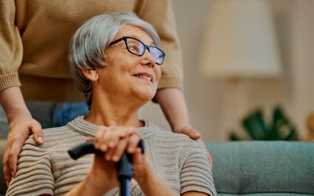 Senior showing care toward a caregiver, reflecting mutual respect and meaningful connection