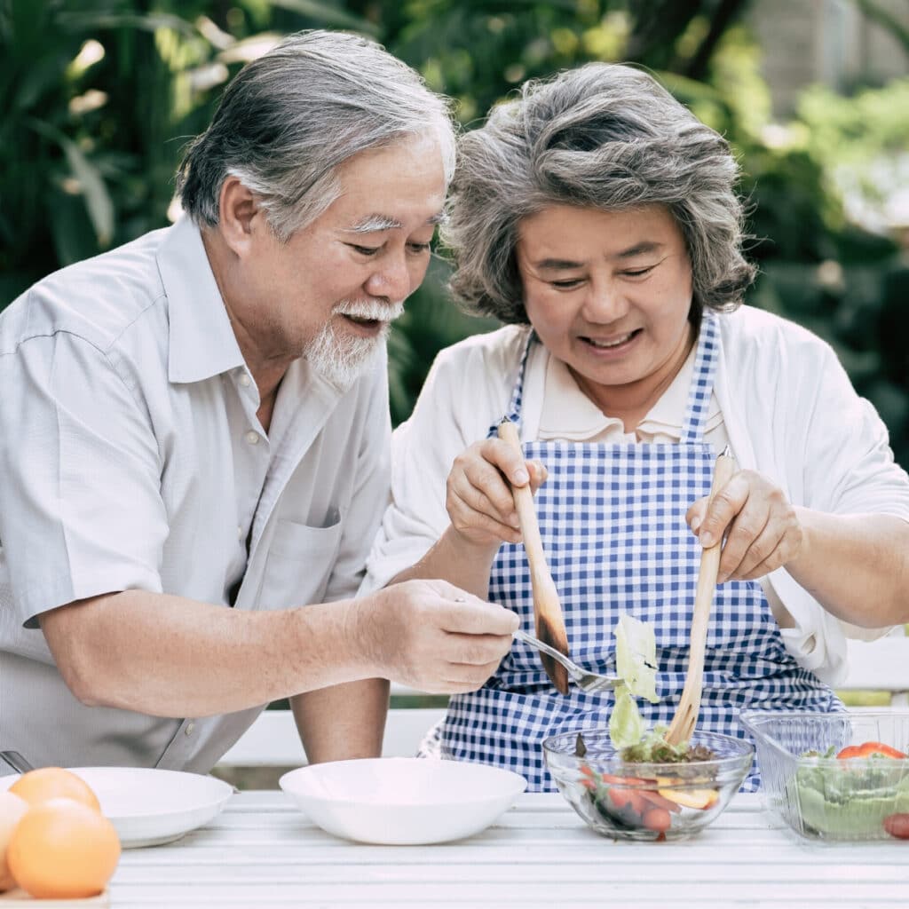 Resident enjoying personalized service in a luxurious care suite, reflecting comfort and vibrant daily living