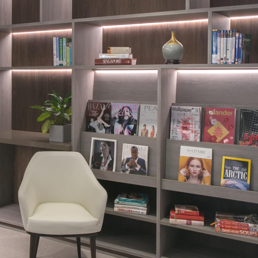 Cozy reading corner with books and comfortable seating, designed for relaxation and leisure