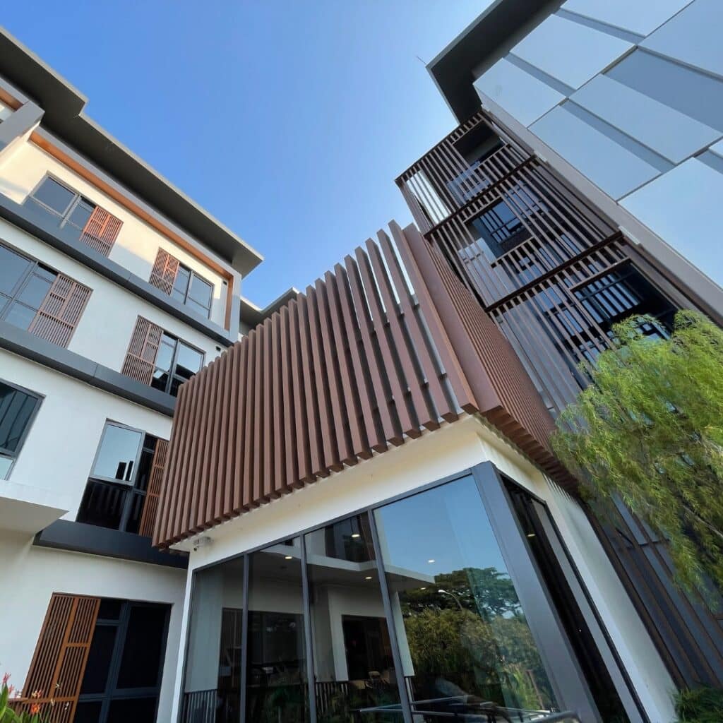 Exterior view of Allium Care Suites, representing growth and commitment in aged care services