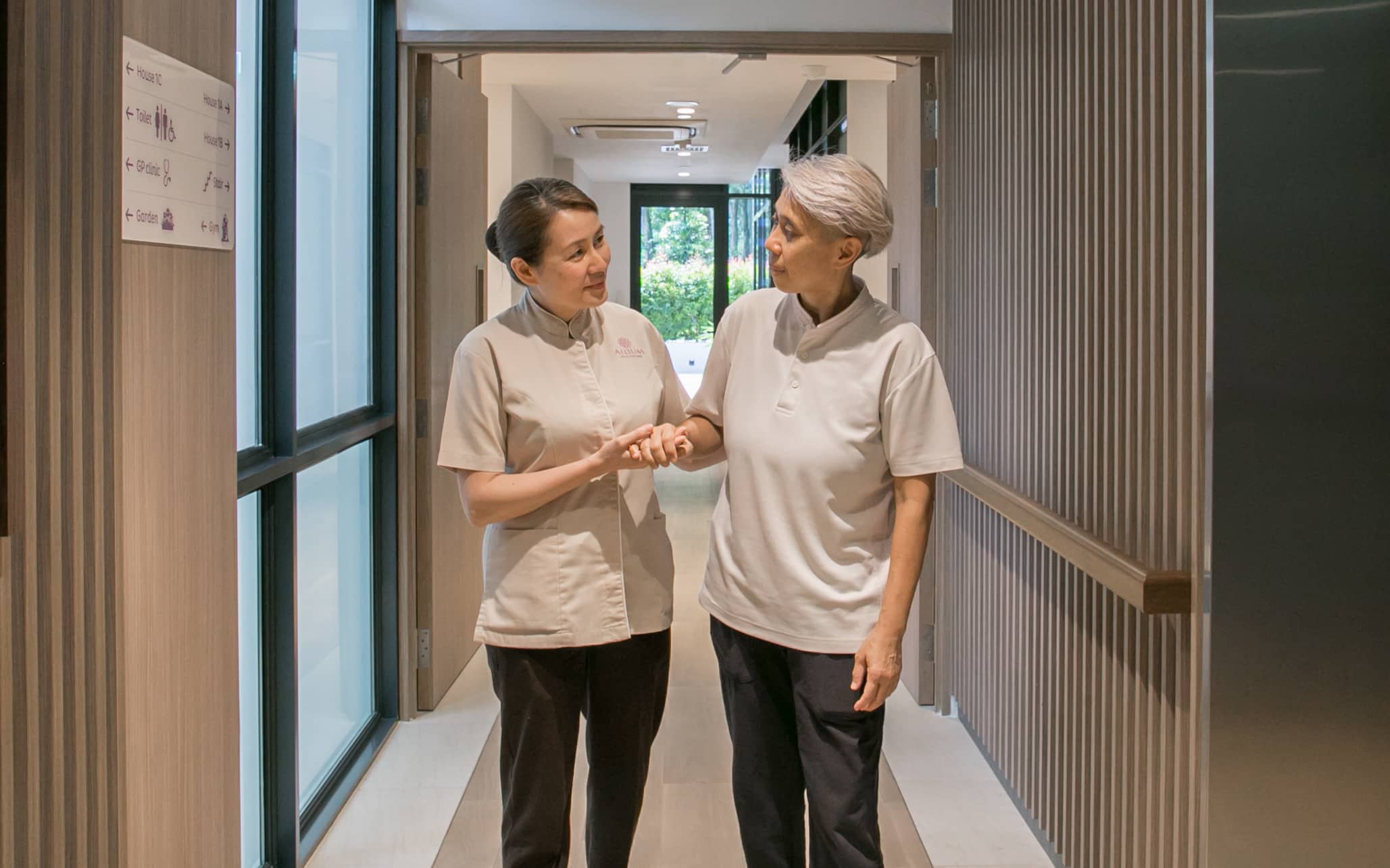 Caregiver gently holding hands with a senior, symbolizing trust and compassion