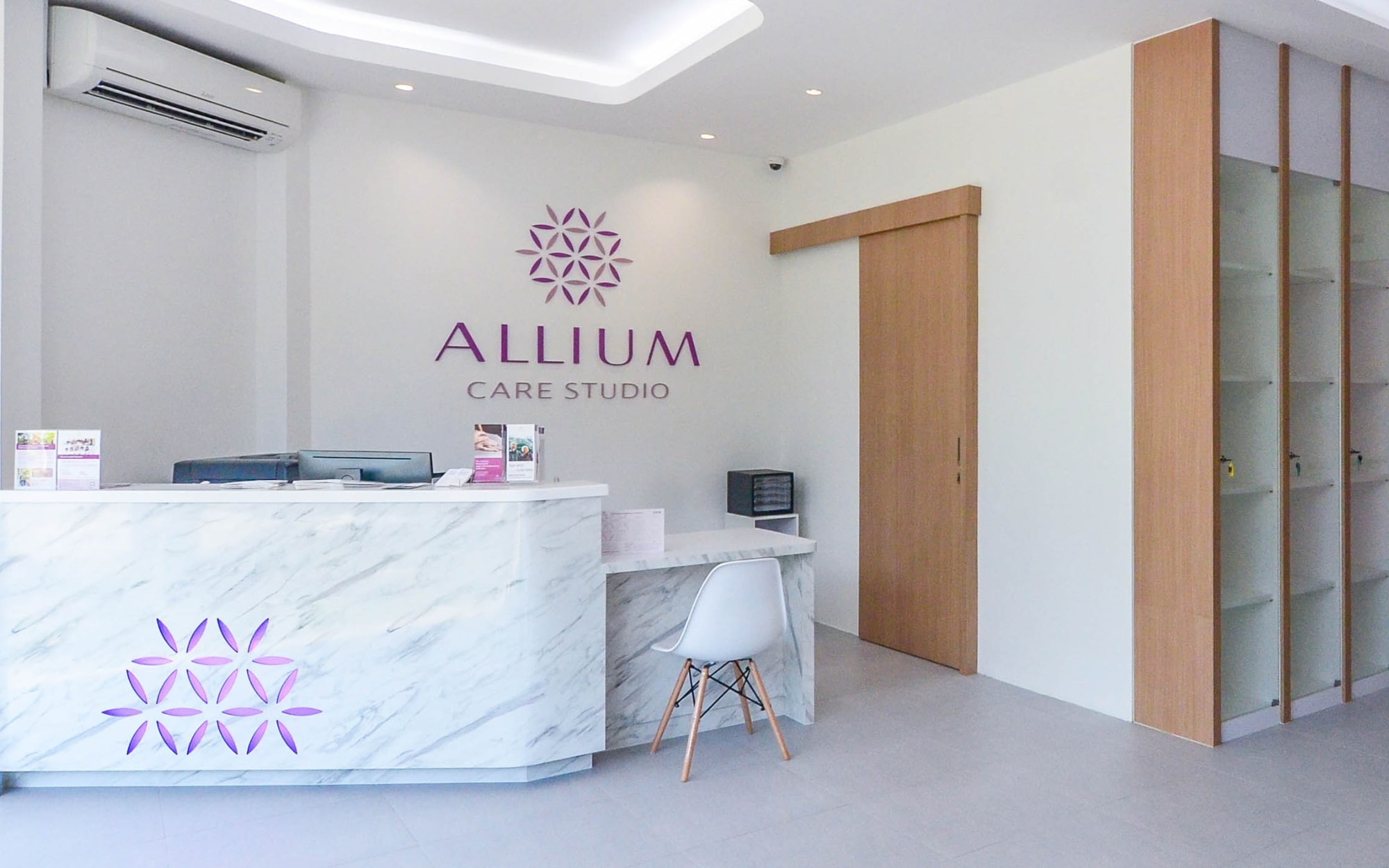 Reception area of Allium Care Studio, featuring a welcoming and professional environment for visitors and residents
